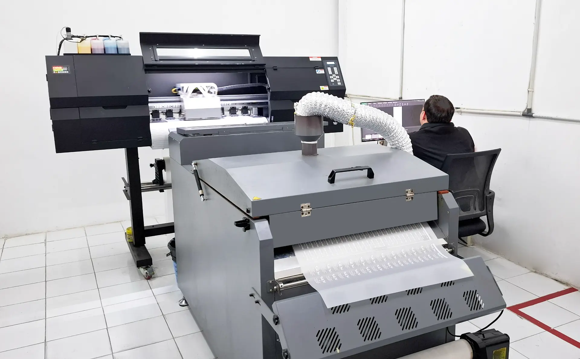 Printer producing heat-transfer labels at the Bali Swim studio