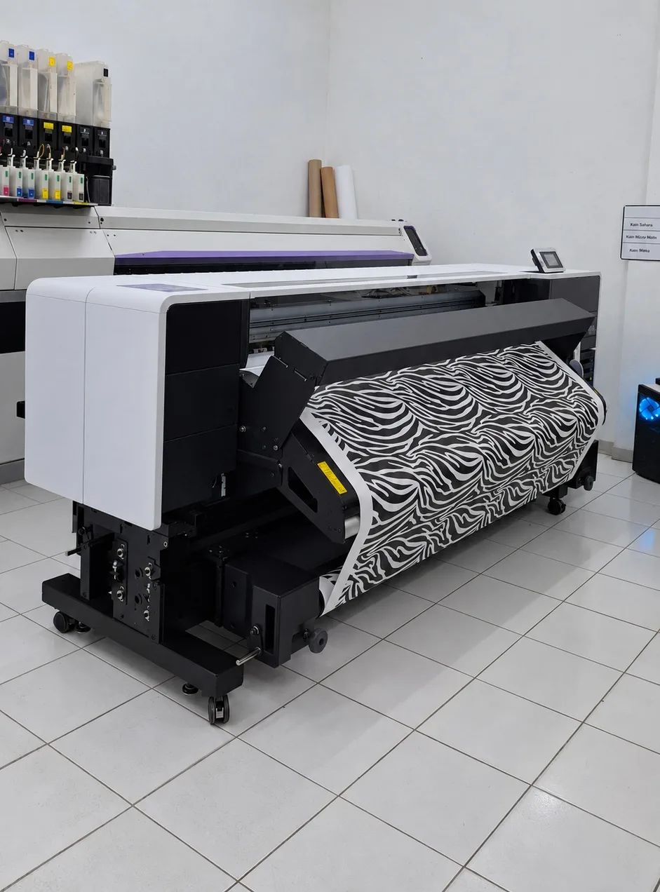 Large-format printer printing a zebra pattern in the Bali Swim print studio